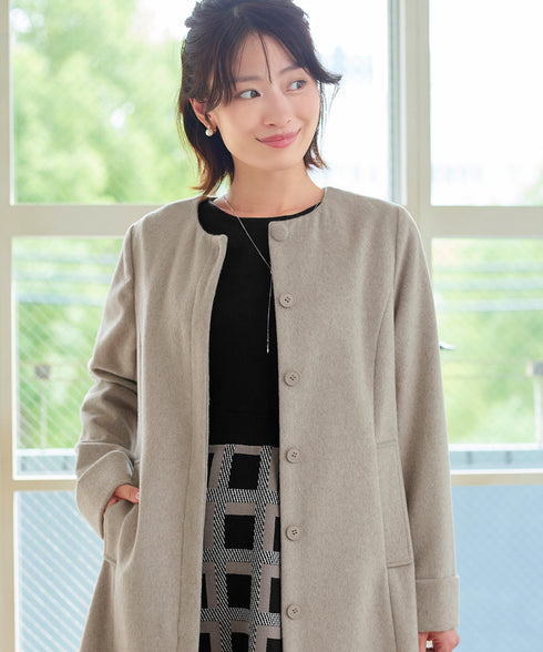 ノーカラーバックリボンウールロングコート